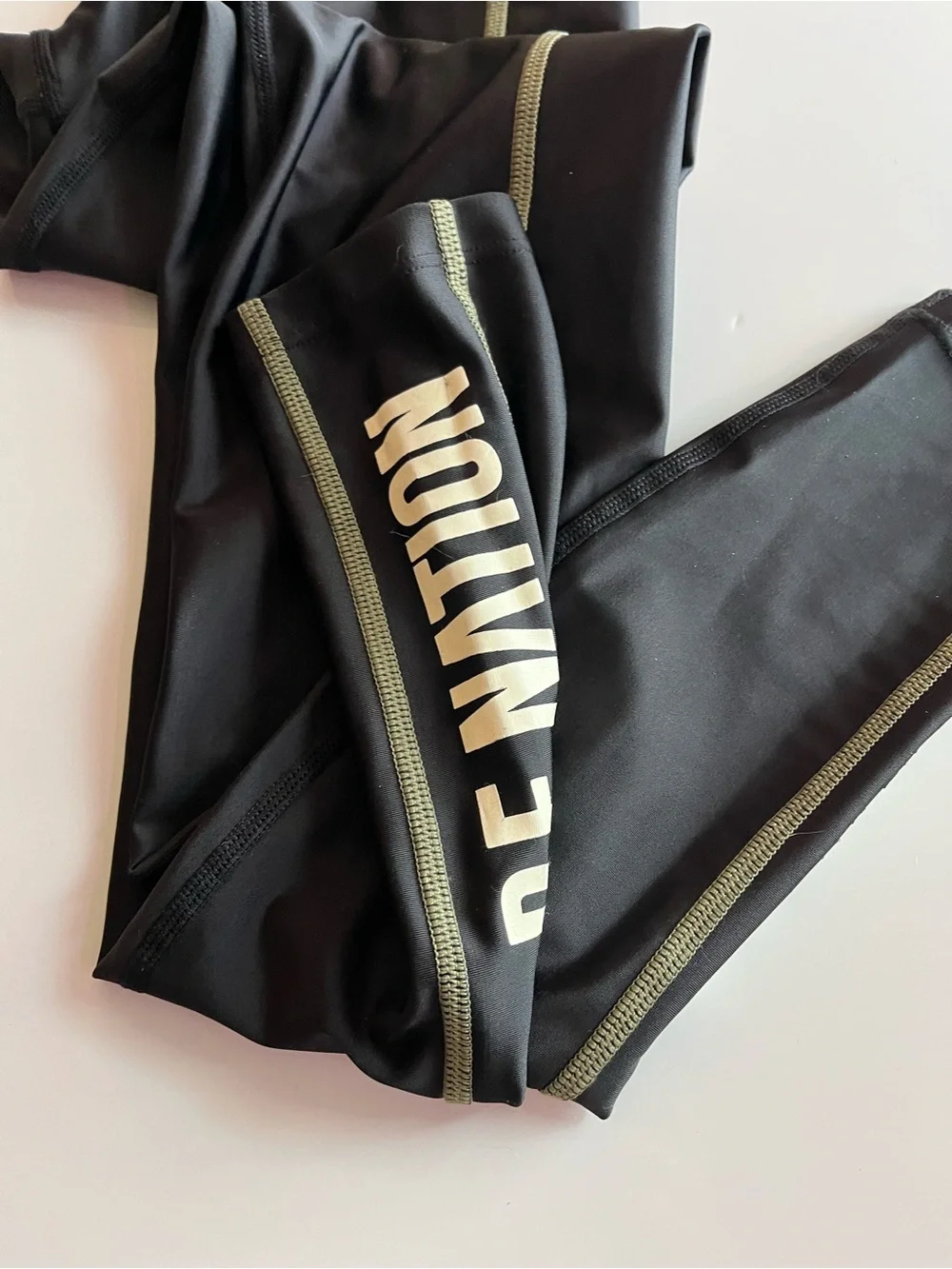 P.E Nation • Black Leggings with Olive Trim and White Logo